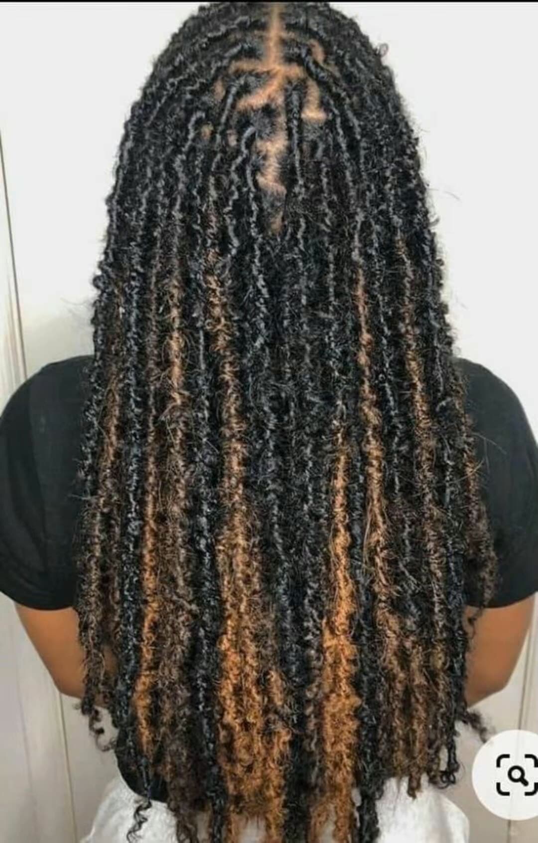 Chez Marie, coiffeuse afro à Köln : photo 1 · BraidBooker