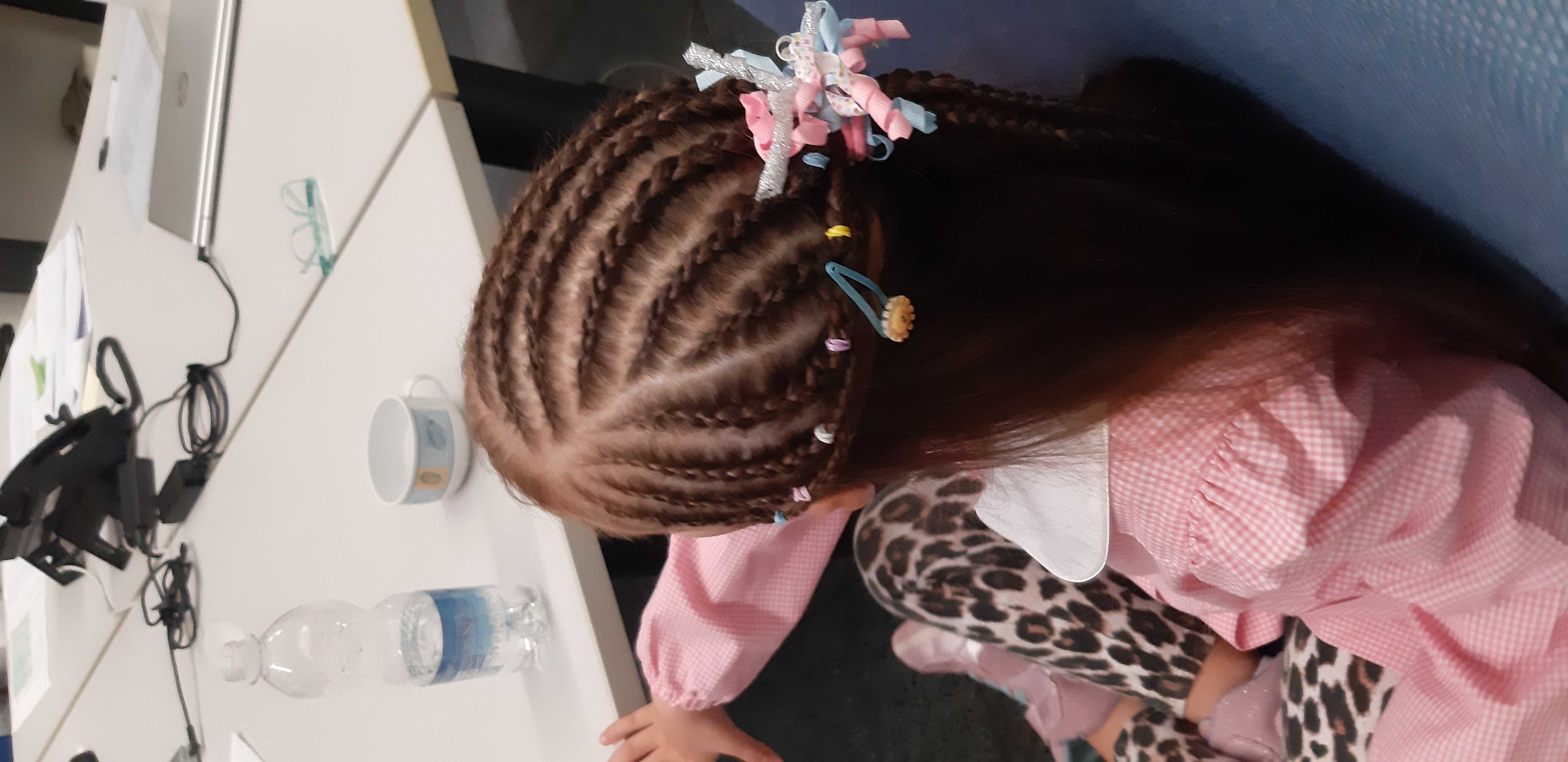 Sandy Hairstyles, Afro-Friseurin in Novara: Foto 1 · BraidBooker