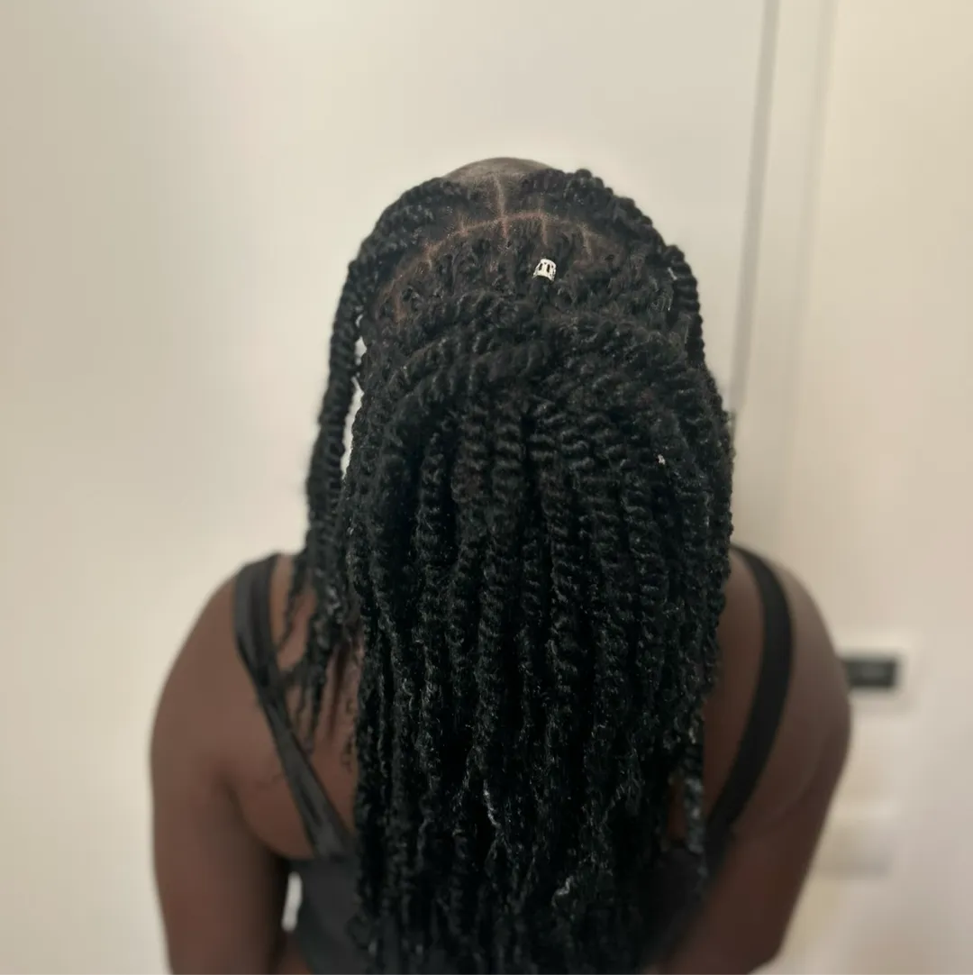 Beauty Reveal by Maryline, afro hair braider in Novara: photo 2 · BraidBooker