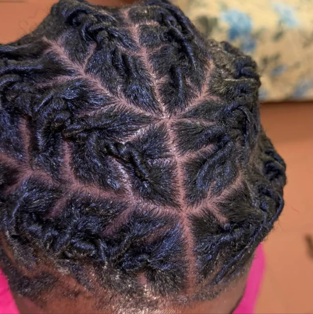 Beauty Reveal by Maryline, afro hair braider in Novara: photo 3 · BraidBooker