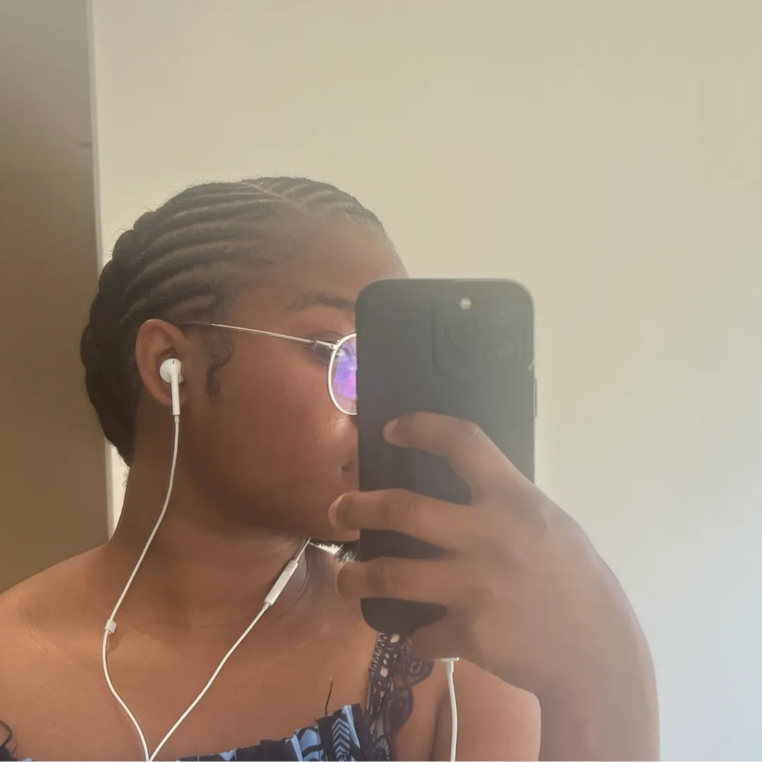 Jennifer, parrucchiera afro a Tours: foto 1 · BraidBooker